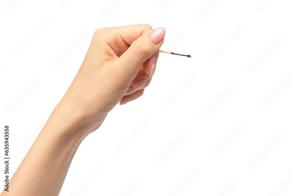Lit match in a woman hand isolated on a white background. Lit match in a woman hand isolated on a white background.