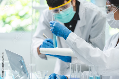 Young scientists conducting...