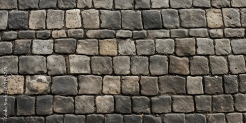 Light gray rough cobblestone, street pavement, background