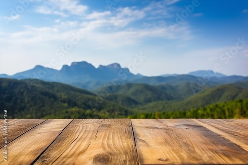 Empty wooden table with mountain view and blue sky background