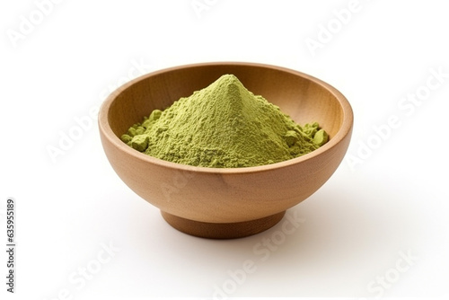 Matcha green tea powder in bowl with spoon isolated on white background