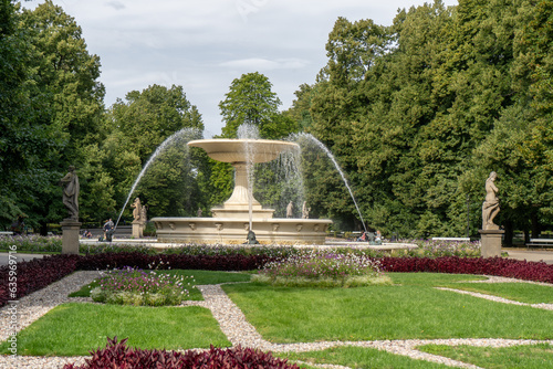 Large old fountain in the park. Warsaw Poland.