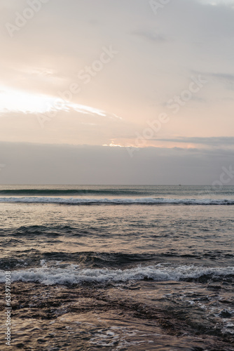 Soft warm sunset on the ocean. Beautiful view of the ocean in the evening