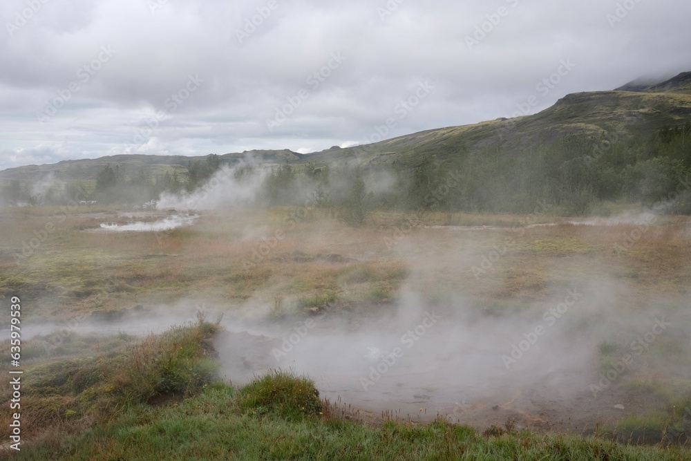 Mist rising from the ground at Geysir Hot Springs in Iceland