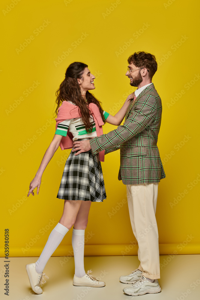 side view, happy man and woman looking at each other, having date, romance, love, students, outfits side view, happy man and woman looking at each other, having date, romance, love, students, outfits