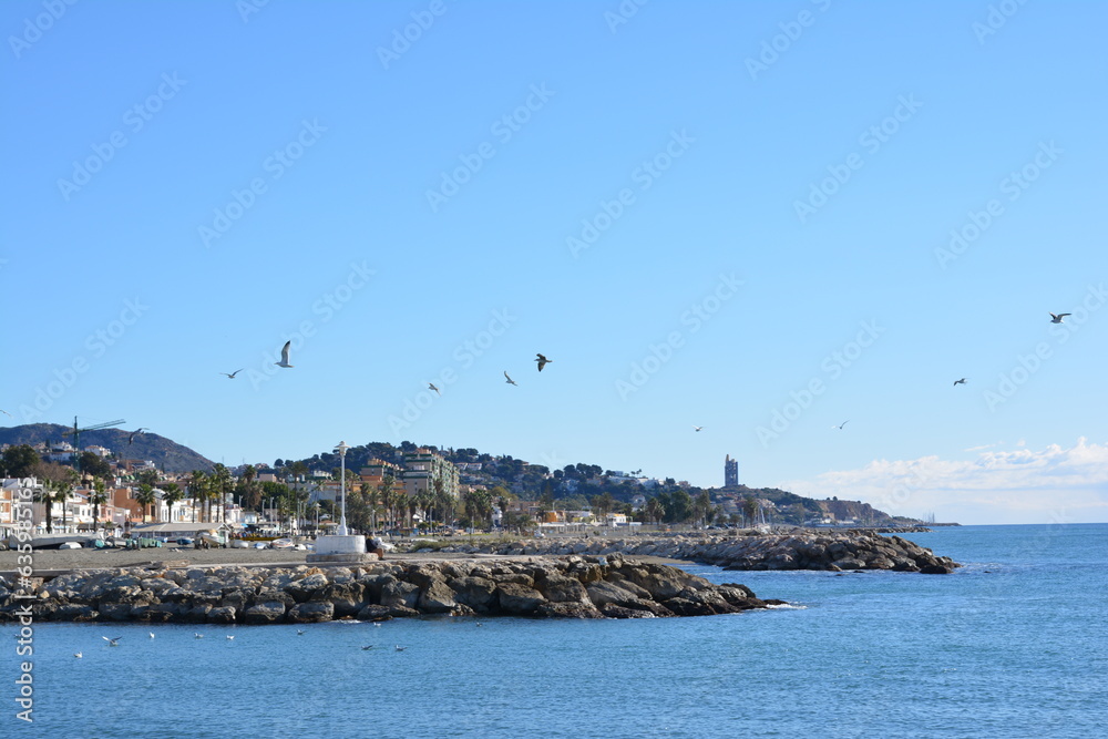 View of coastal houses from the sea, Malaga, Spain. Resort area in Malaga - Marítimo el Pedregal View of coastal houses from the sea, Malaga, Spain. Resort area in Malaga - Marítimo el Pedregal