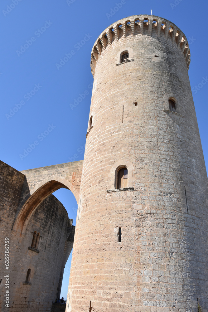 Cylindrical Tower Connected to Spanish Castle by Gothic Arch Walkway, Portrait