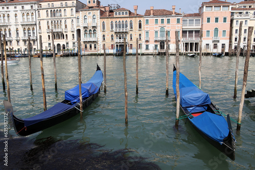 View of gondolas and poles in the canal grande from Campo di Salute - Venice - Italy © Collpicto