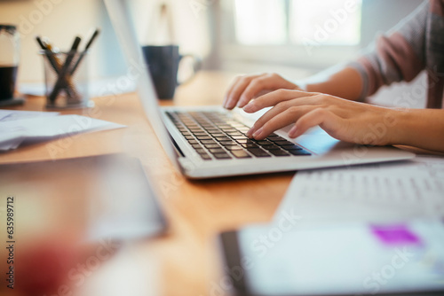 Tapeta Young caucasian woman using laptop while working and studying at home