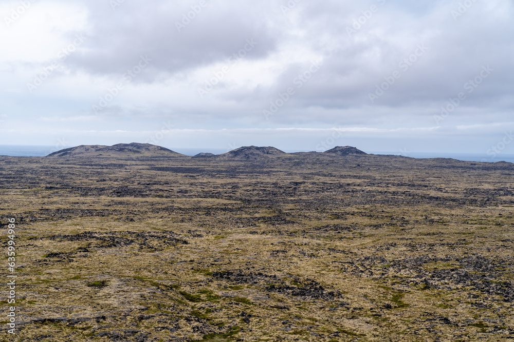 Barren, desolate volcanic landscape of Iceland, as seen from the Saxholl Crater, Snaefellsness Pensinsula