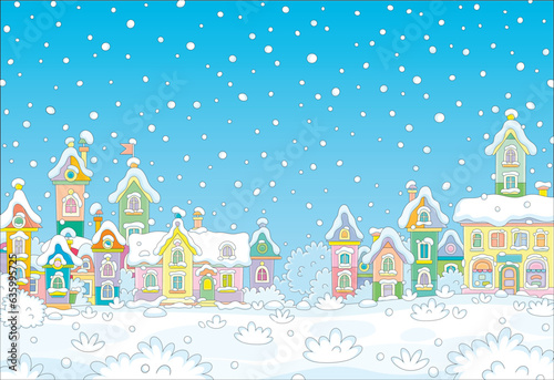 Colorful toy houses covered with snow on a beautiful snowy winter day in a pretty small town, vector cartoon illustration