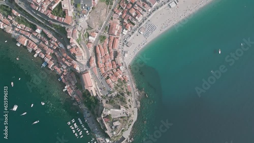 Aerial top view video of city buildings and mountains on the sea shore in Reggio Calabria, Italy photo