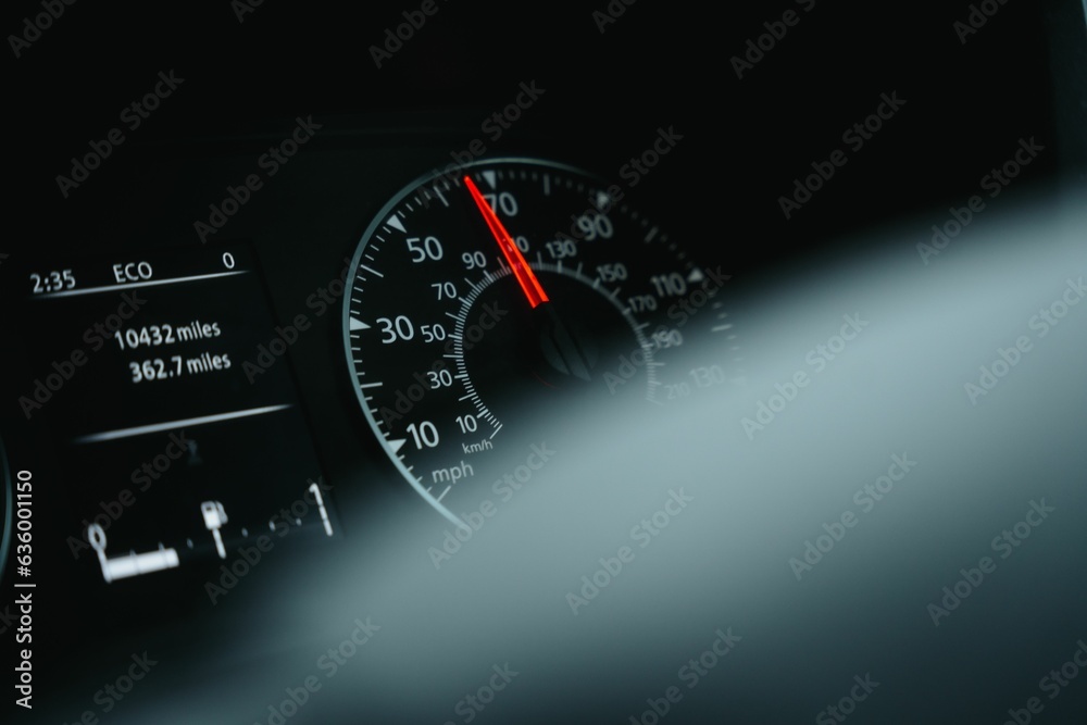 Speedometer and other gauges on the dashboard of a car
