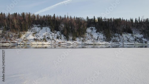Wallpaper Mural Aerial video of a frozen river with trees on the shore in winter Torontodigital.ca