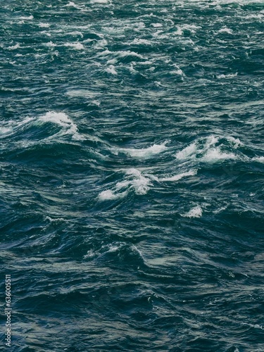 Scenic view of blue waves in the sea © Wren Fernandes/Wirestock Creators