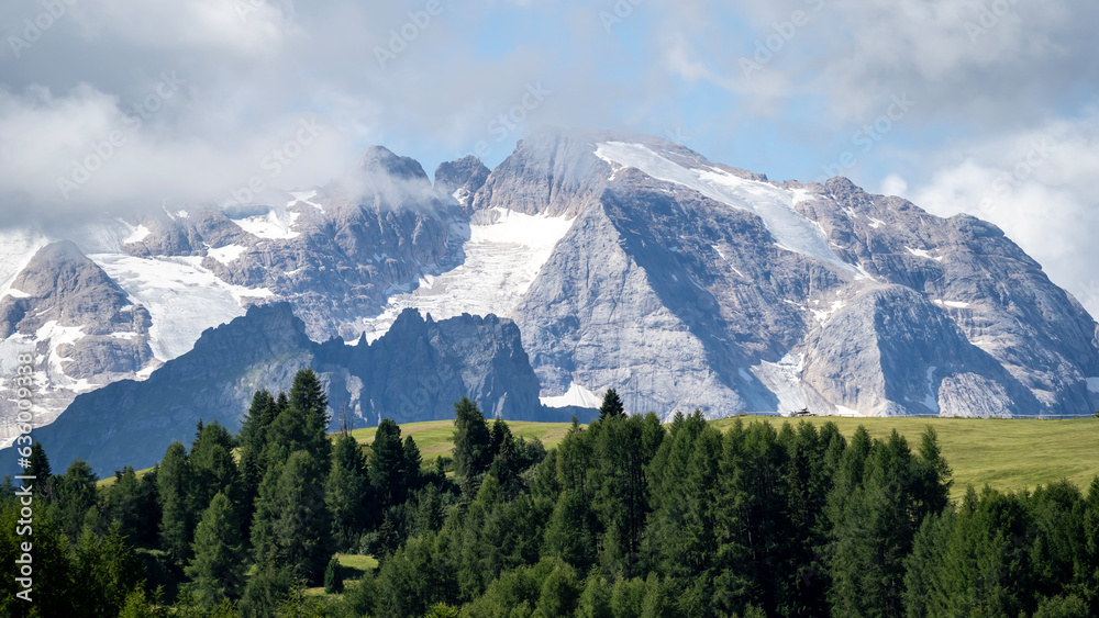Amazing landscape to the Dolomiti and its glaciers during summer time. Melting of glaciers due to global warming. Global climate change. Italian alps
