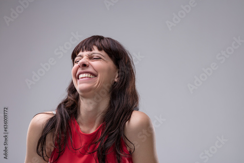 Female mocks others, delighting in their misfortune