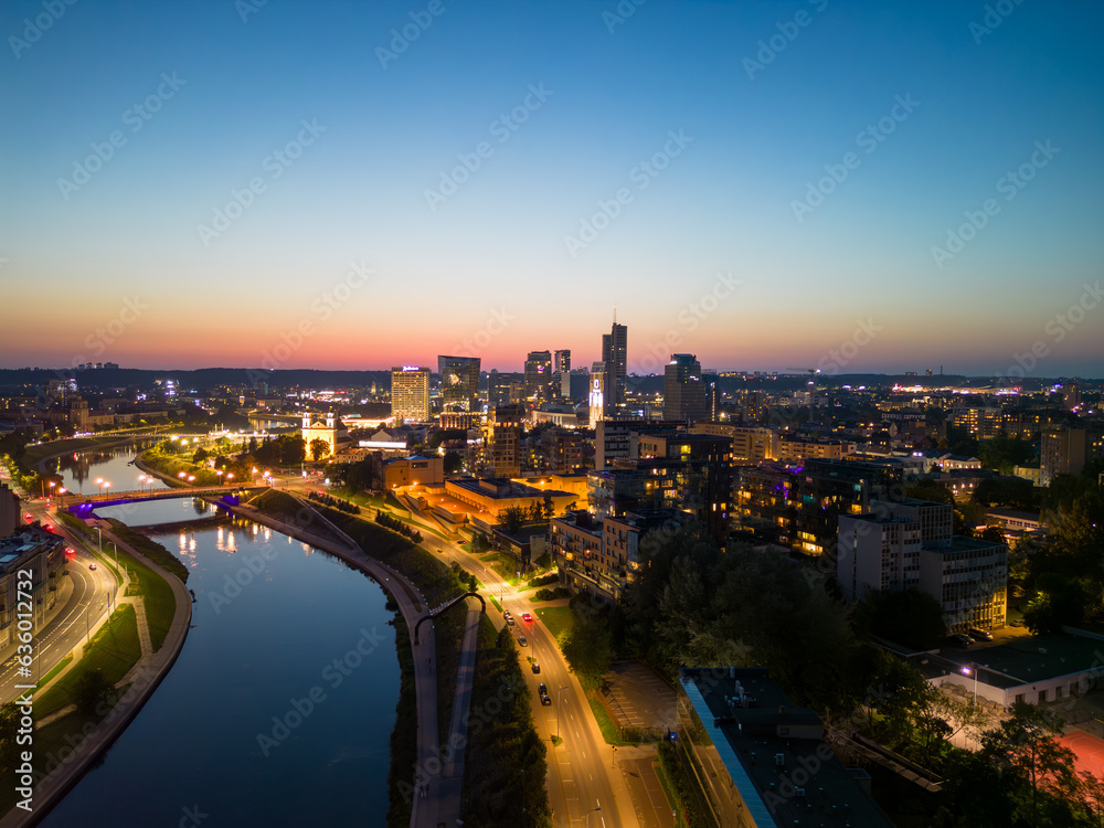 Beautiful night view of downtown Vilnius with lights and skyscrapers