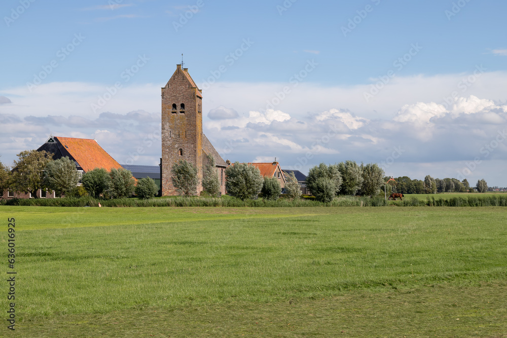 Old church -  Bartholomeuskerk, in the countryside near the rural village of Westhem in Friesland.