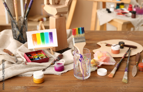 Glass with brushes, paints ...