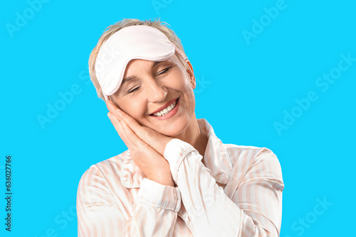 Mature woman in pajamas wit...