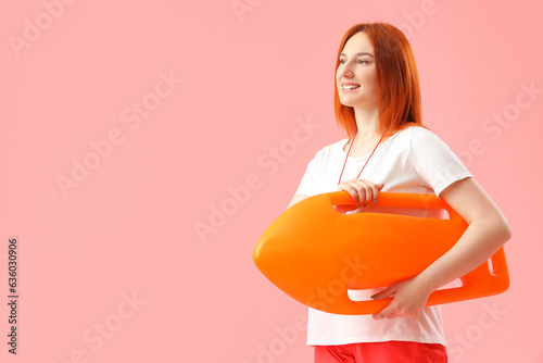 Female lifeguard with rescu...