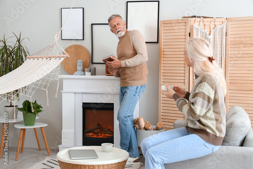 Mature couple resting near ...