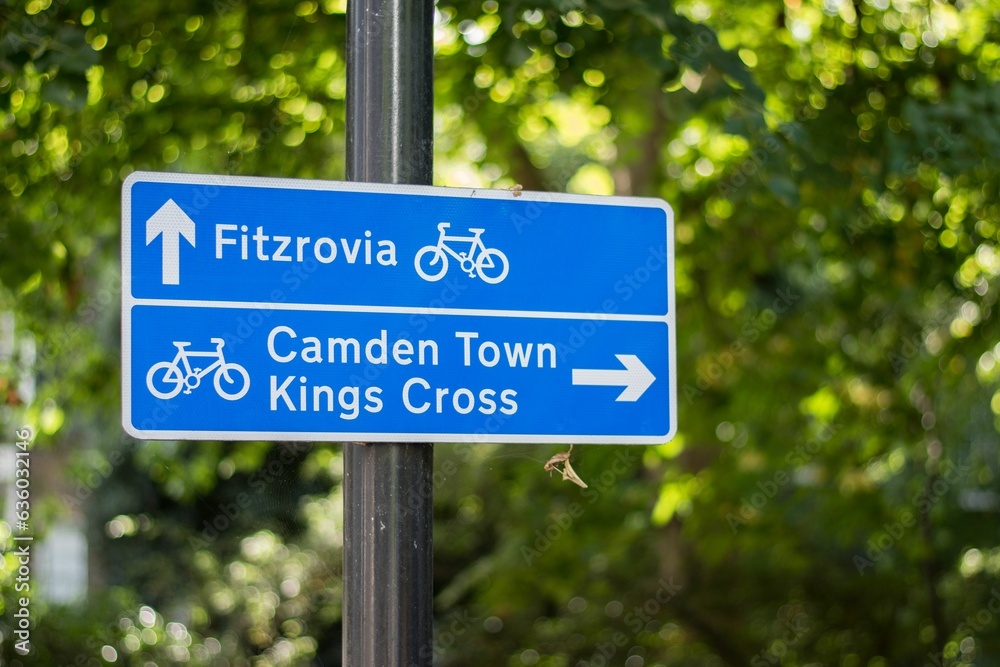 A street sign giving directions along cycle paths in London, UK.