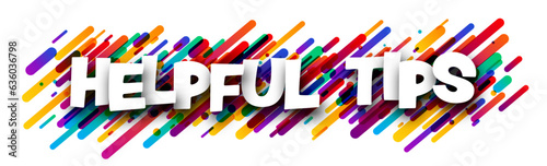 Helpful tips sign over colorful brush strokes background.
