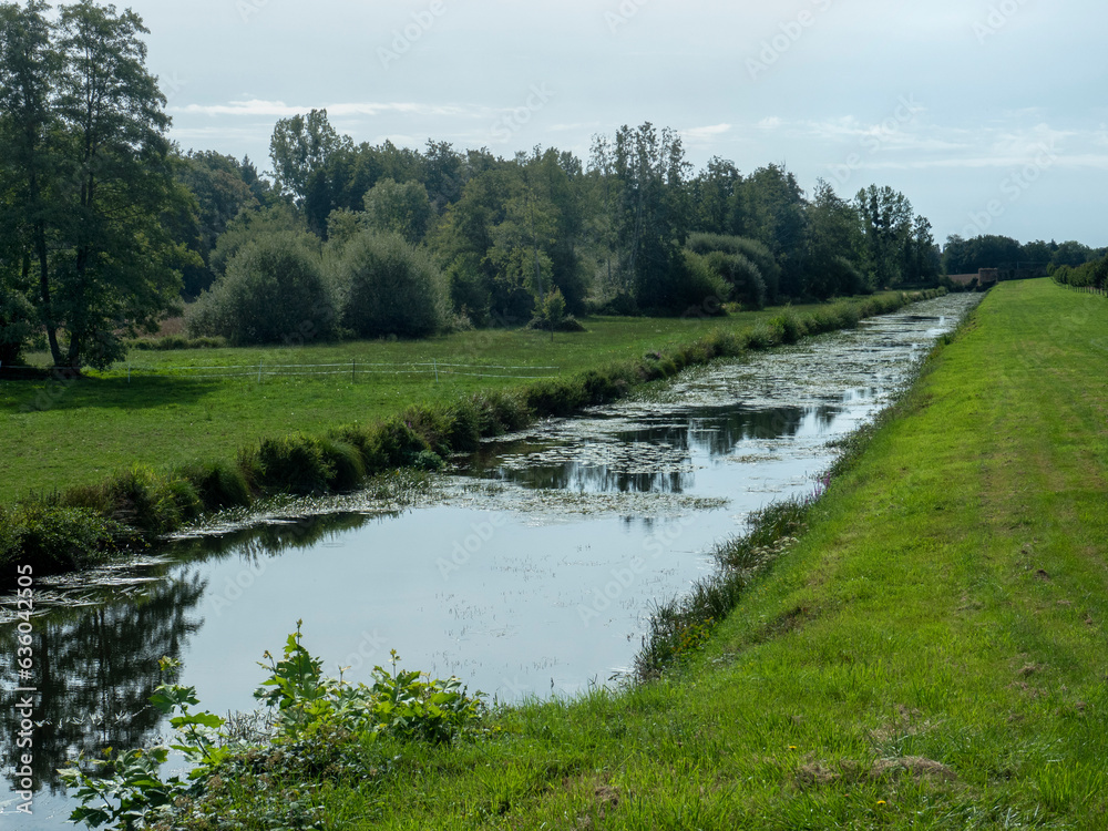The Royneau, tributary of the Eure in Pontgouin near the château de la Rivière, Eure et Loir, France. The Royneau, tributary of the Eure in Pontgouin near the château de la Rivière, Eure et Loir, France.