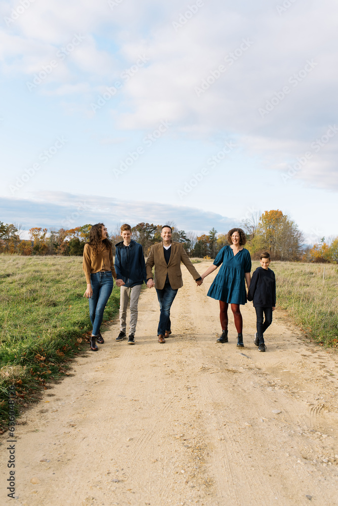 Happy family with teenage children laughing together