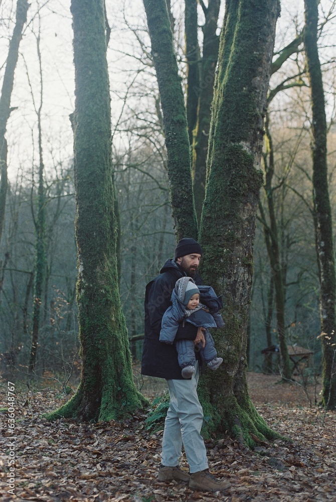 Young Father Carrying Child Young Father Carrying Child