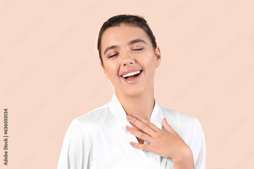 Young woman with beautiful lips on beige background, closeup Young woman with beautiful lips on beige background, closeup