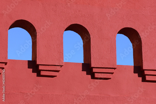 Pink facade with arches photo