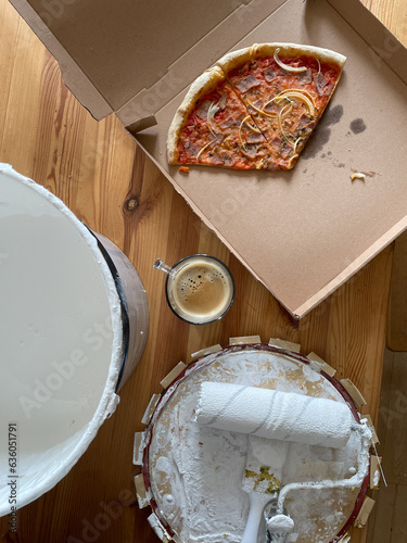 UGC of paint roller and bride on rabble with pizza and coffee 