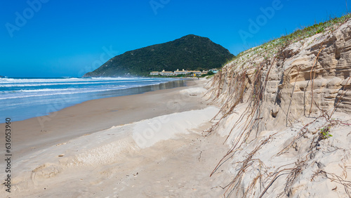 high tide eroding the dunes of Santinho beach in the city of Florianópolis Santa Catarina Brazil