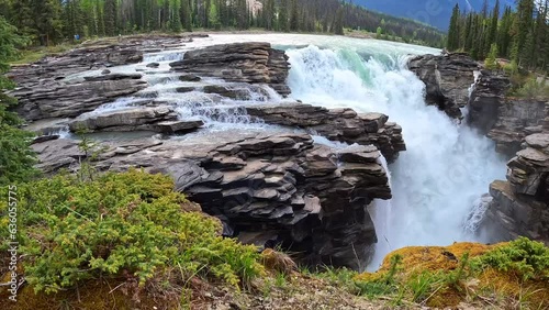 The Athabasca Falls on the Ice Fields Parkway in Jasper National Park in Canada. photo