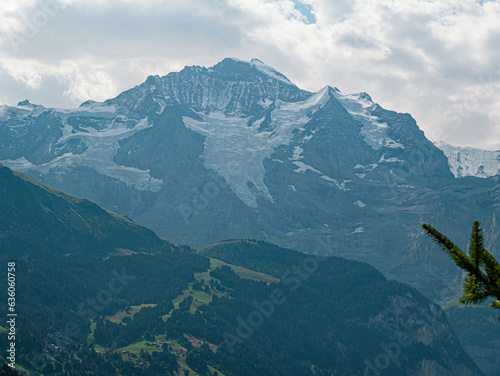 Jungfrau Mountainpeak alps 4500m cloudy day huge Glaciers