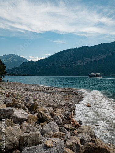 Ferry passing by at thunersee Mountainlake switzerland Berner Oberland