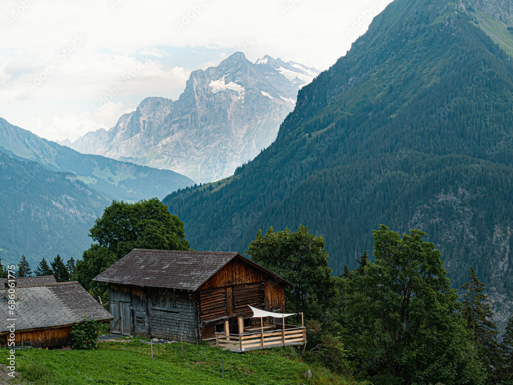 Alpine Village in switzerland with view at Jungfrau region Top of Europe Wetterhorn Mountain Alps