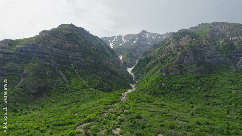 Descending aerial view of majestic mountains in Provo Canyon during rainfall Descending aerial view of majestic mountains in Provo Canyon during rainfall