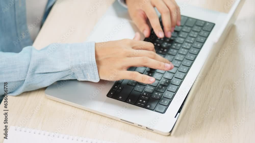 Cheerful business Asian young woman working on laptop in office work in workplace. Attractive female employee office worker smile. Cheerful business Asian young woman working on laptop in office work in workplace. Attractive female employee office worker smile.