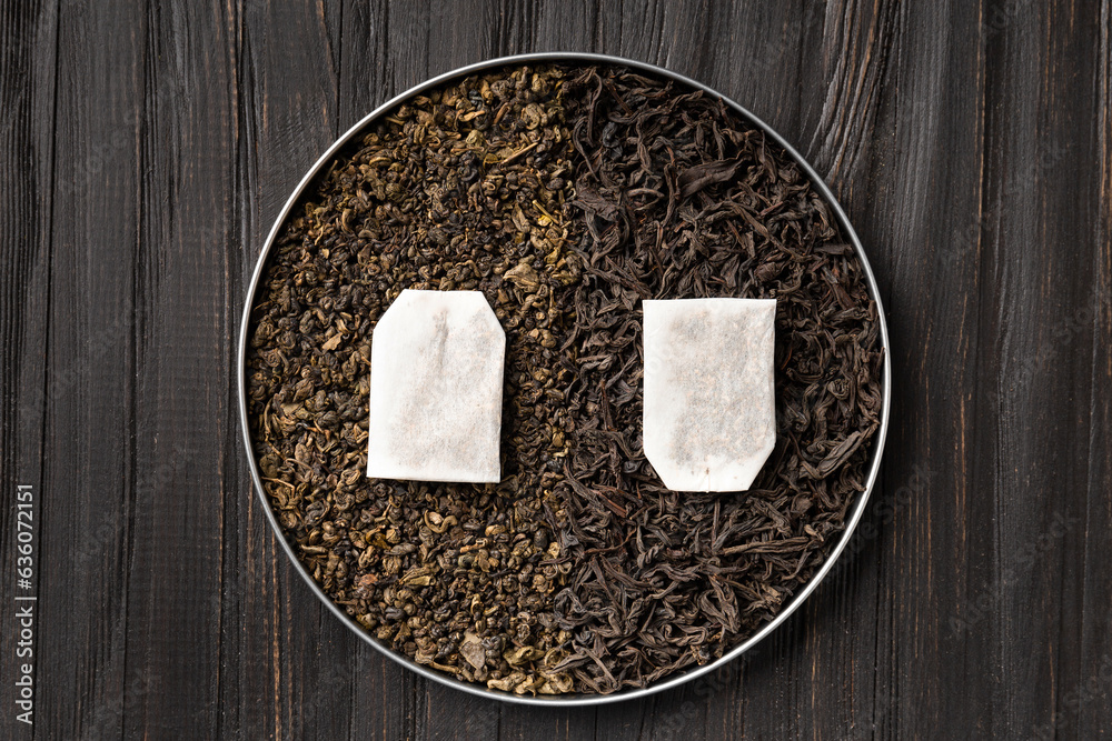 Composition of green, black tea and tea bags top view copy space Composition of green, black tea and tea bags top view copy space
