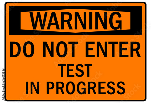 Testing in progress warning sign and labels do not enter