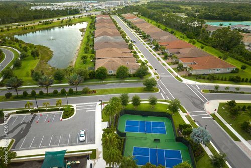 Aerial view of blue tennis courts for sports recreational activity
