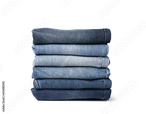 Stack of different folded jeans isolated on white