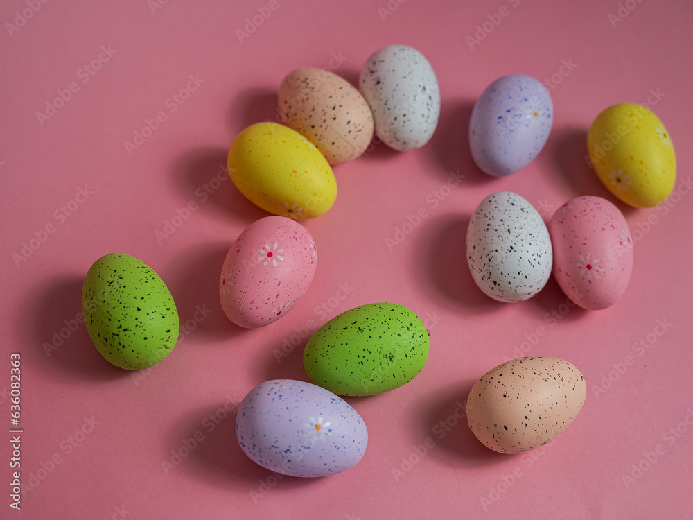 Painted quail eggs on a pink background. Easter decorations. Painted quail eggs on a pink background. Easter decorations.