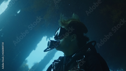 Portrait of a man scuba diver meditative moment
