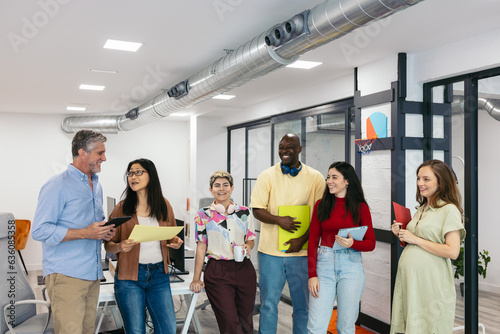 Group portrait of diverse workers in a modern office photo