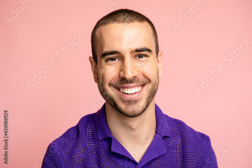 Portrait of a man smiling.